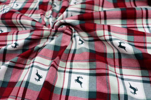 Jerseystoff mit Hirschen und Karos 