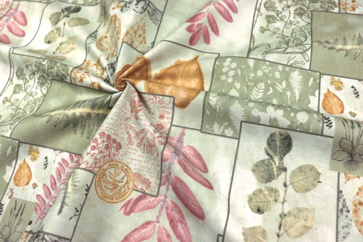 Dekostoff mit botanischem Patchwork-Motiv 