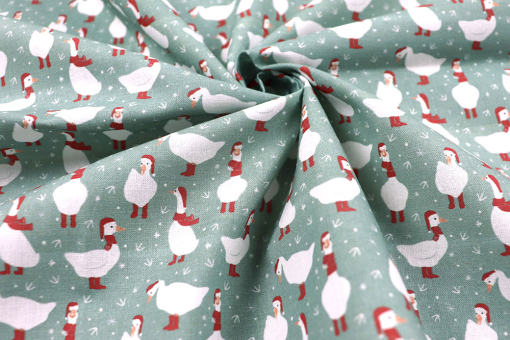 Baumwollstoff mit weihnachtlichen Gänsen 